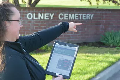 pointing in direction showing ipad