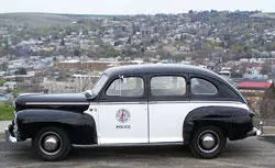An early 20th century police car