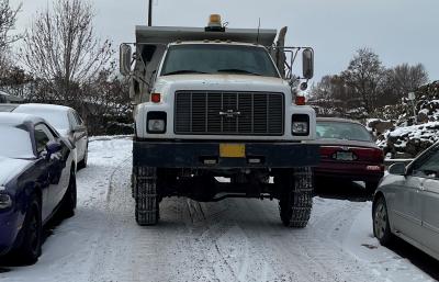 gravel_spreading_photo_2_crop.jpg Photo of truck spreading gravel