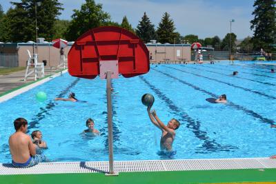 Kids playing water basketball