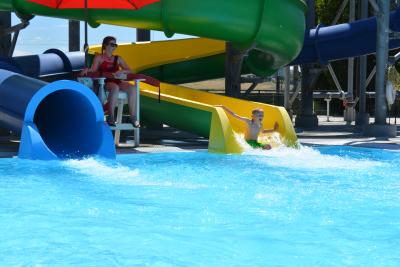 Kid exiting water slide