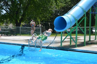 Kid exiting water slide