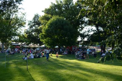 crowd gathered around outdoor ampitheatre