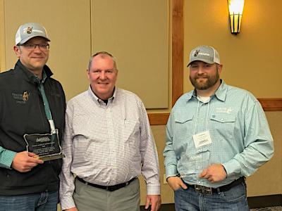 Assistant Public Works Director Kyle Willman and Public Works Superintendent Casey Currin receive awards at the APWA conference
